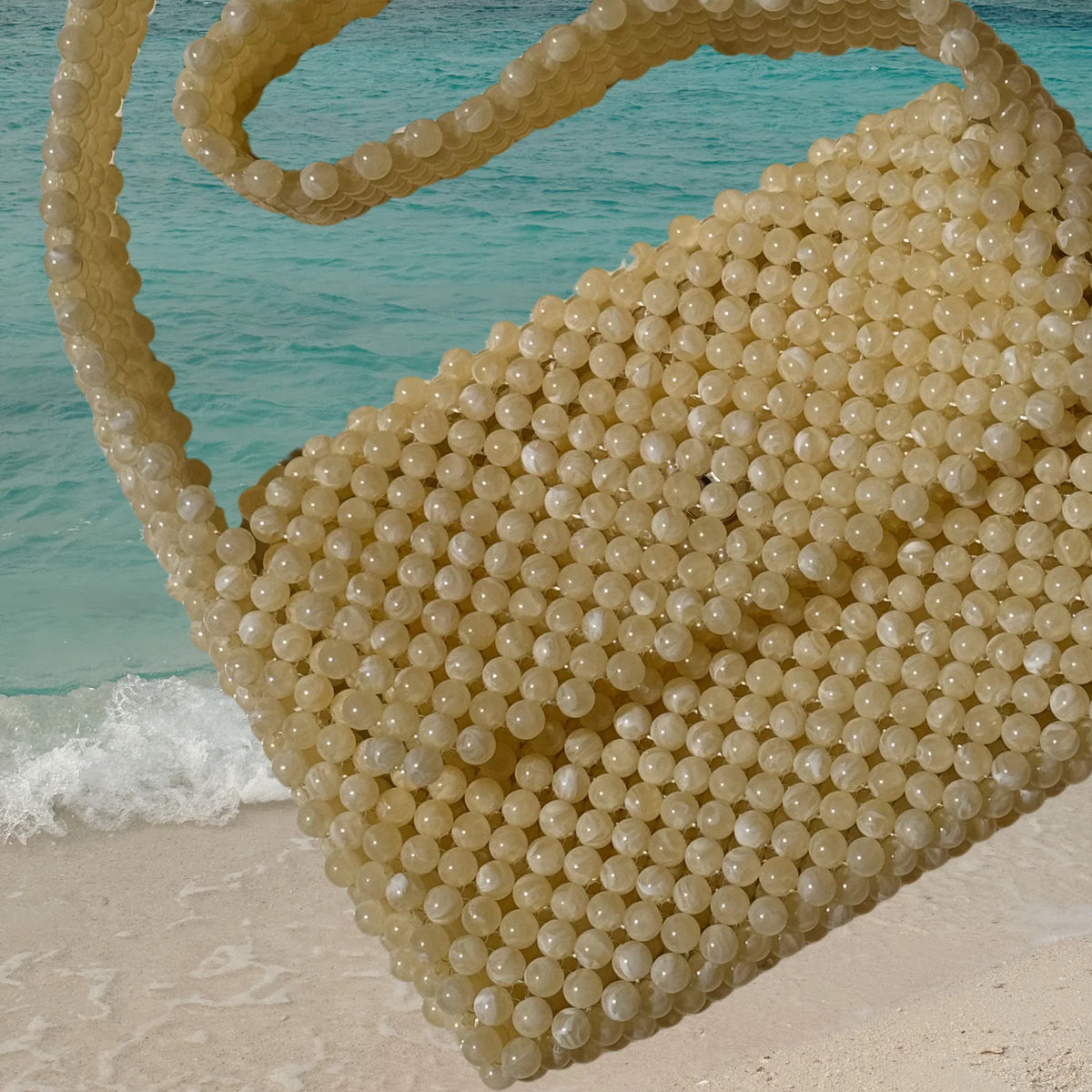 THE LOVINA BEADED BAG