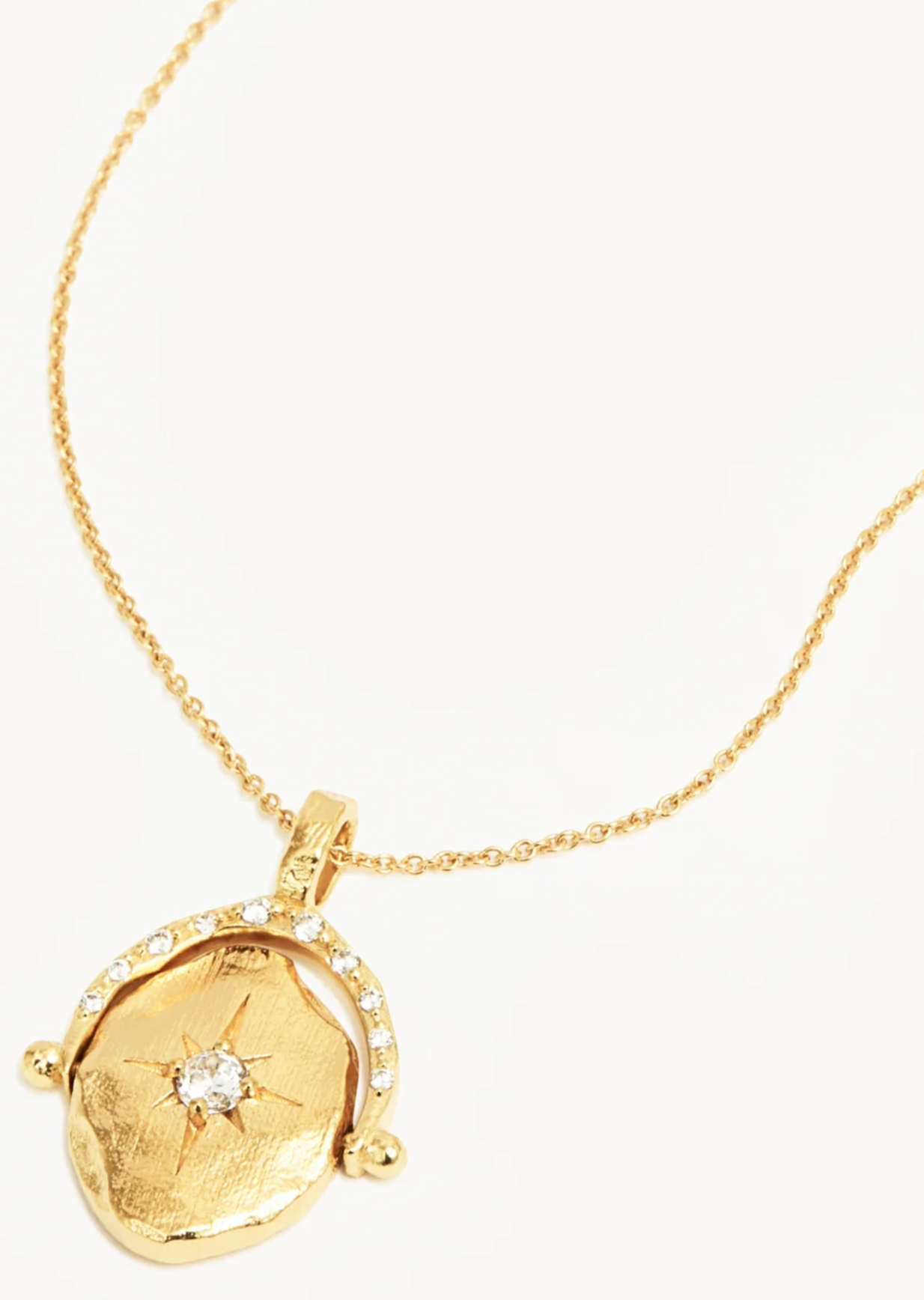 NORTH STAR SPINNER NECKLACE